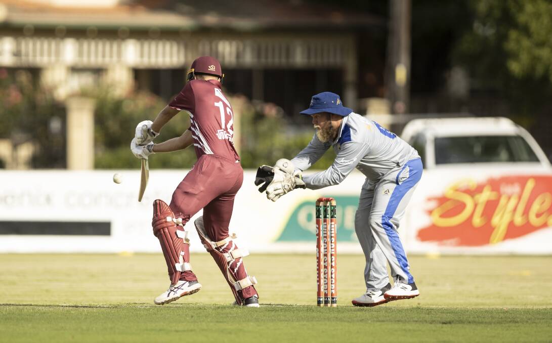 CLASSIC: Michael Grohmann looks to add to Wodonga's score against Albury last night as wicketkeeper Daniel Welsh watches on. The visitors racked up 7/202 but were pushed all the way in a thrilling T20. Picture: ASHLEY SMITH
