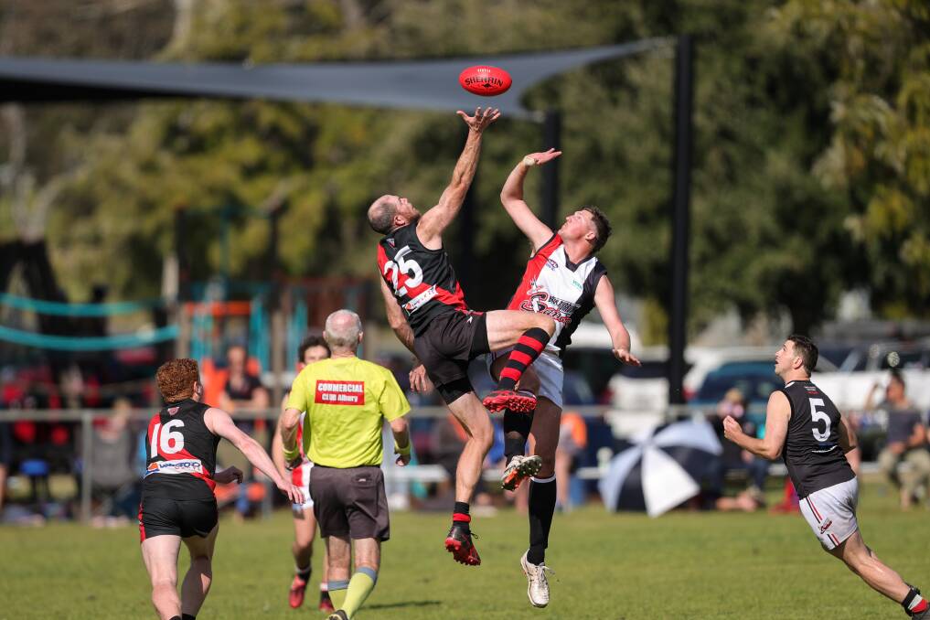 Peter Hancock's final opponent in the ruck was Corey Pearse of Brock-Burrum. Picture by James Wiltshire