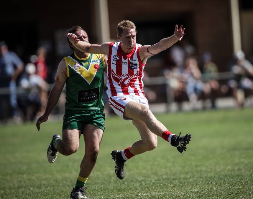 SWAMPIE ROYALTY: James Ellis has retired from senior football after more than 200 games at Henty, where he not only won a flag but the respect of those he played with and against in the Hume league. Picture: JAMES WILTSHIRE