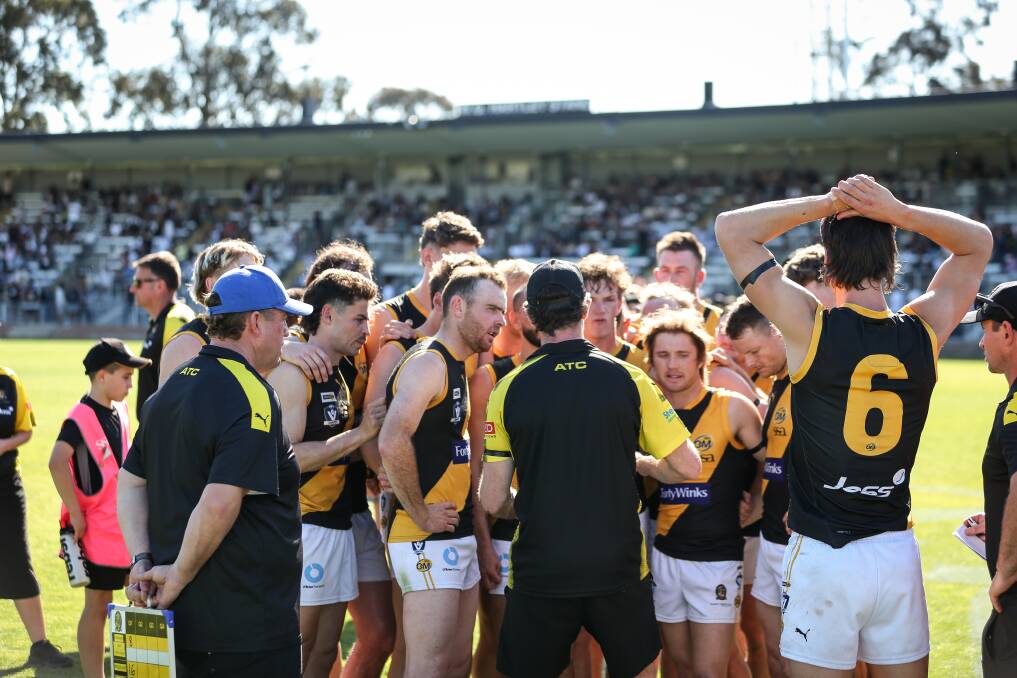 Albury co-coach Shaun Daly addresses his players. Picture by James Wiltshire