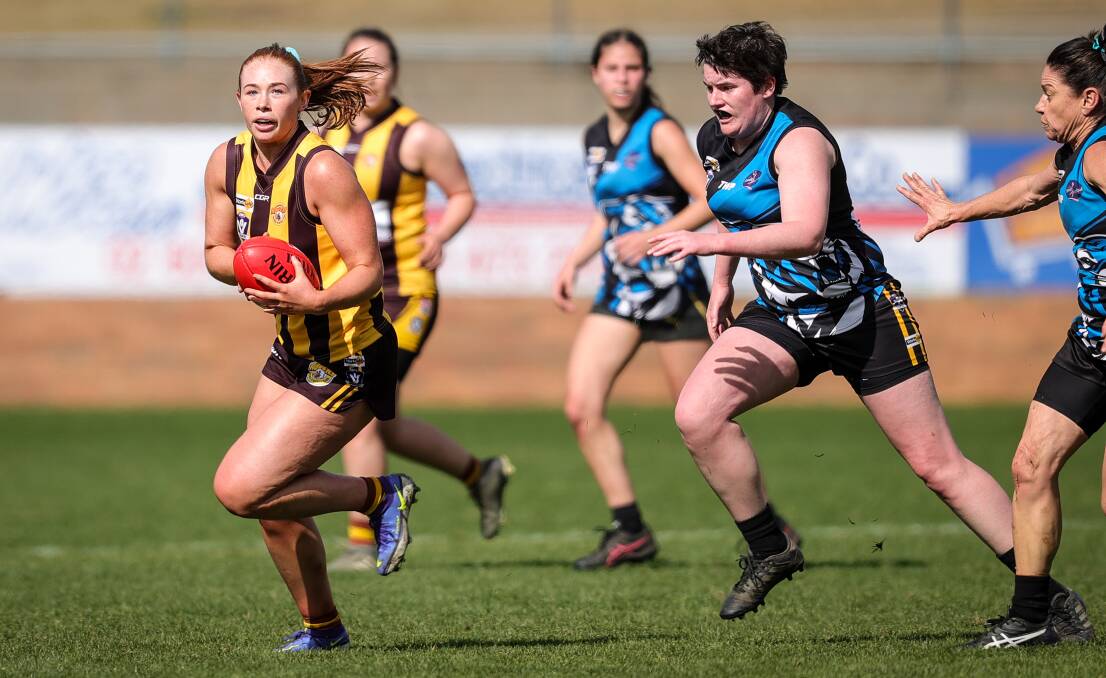 CATCH ME IF YOU CAN: Wangaratta Rovers' Mikaela Trethowan, who kicked two goals in the elimination final, leaves her opponent trailing in her wake. Pictures: JAMES WILTSHIRE