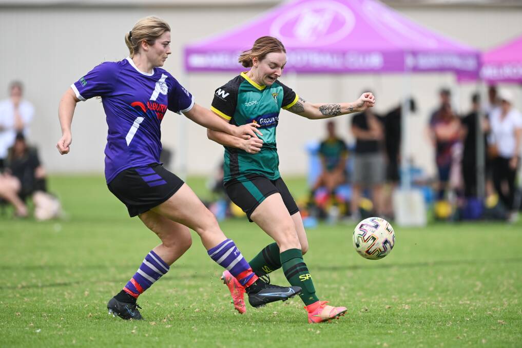Melrose captain Maya Davis gets to the ball ahead of Amelia Watson. Picture: MARK JESSER
