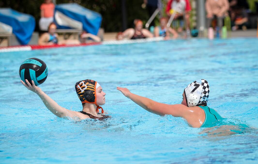 Albury Tigers' Meg Bauerle keeps the ball out of reach. Picture by James Wiltshire