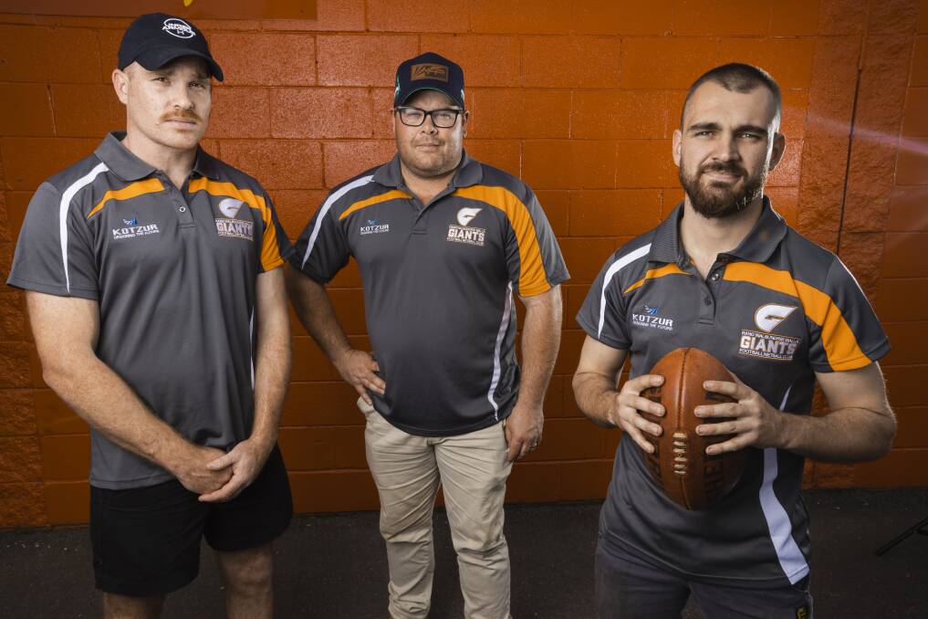 Giants co-coaches Jack Duck and Daniel Athanitis with new recruit Clay Moscher-Thomas. Picture by Ash Smith