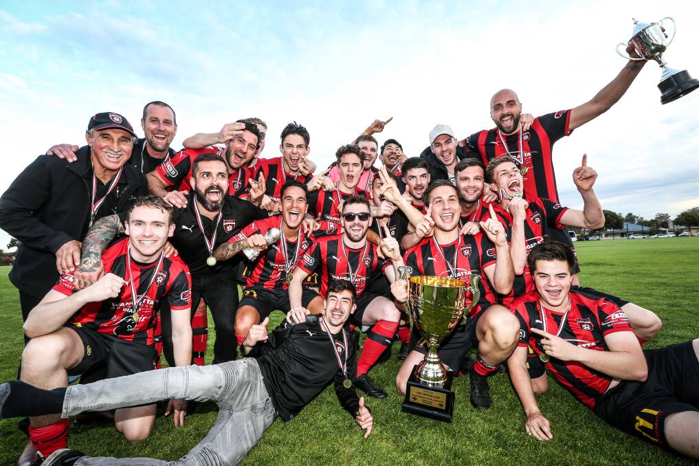 Daniel Vasilevski and his Wangaratta players celebrate their 2019 cup final win. Picture: JAMES WILTSHIRE
