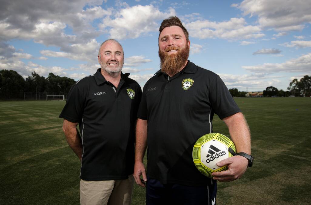 St Pats president John Mahoney with new coach Josh O'Farrell. Picture: JAMES WILTSHIRE