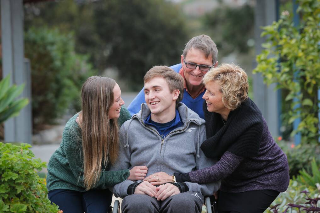 James McQuillan with his wife, Kathryn, and parents, Jack and Jo, in 2014.
