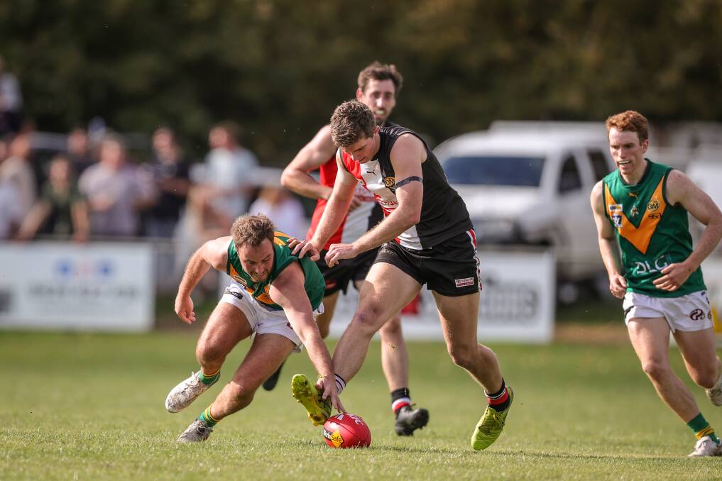 Tim Broomhead gets his head over the footy against Myrtleford. Picture: JAMES WILTSHIRE
