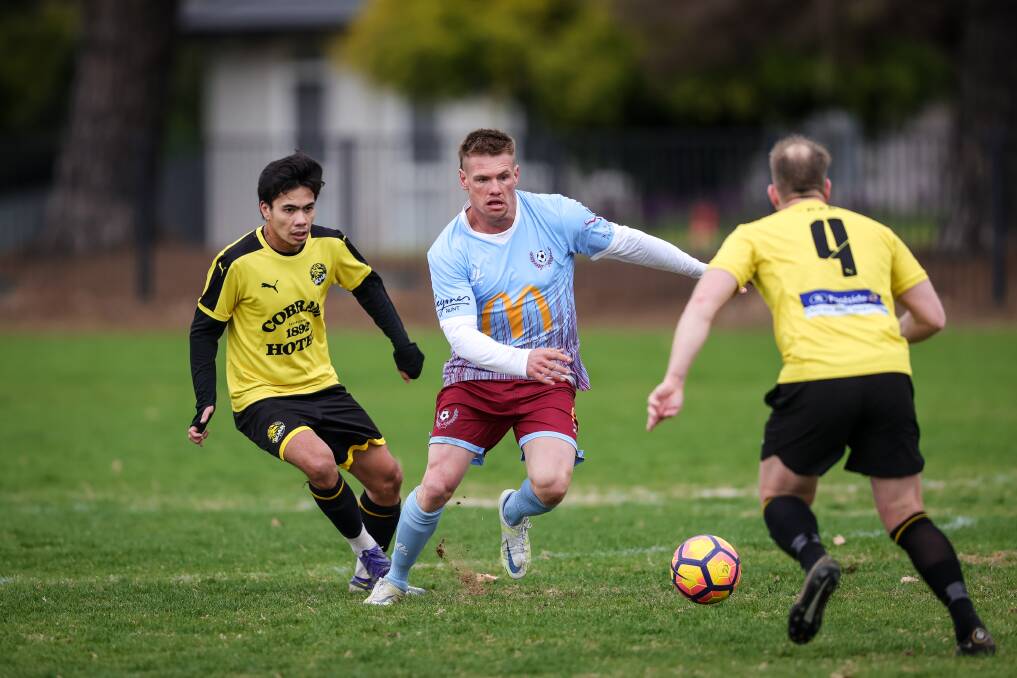 Shane Hasler on the ball for Twin City. Picture: JAMES WILTSHIRE