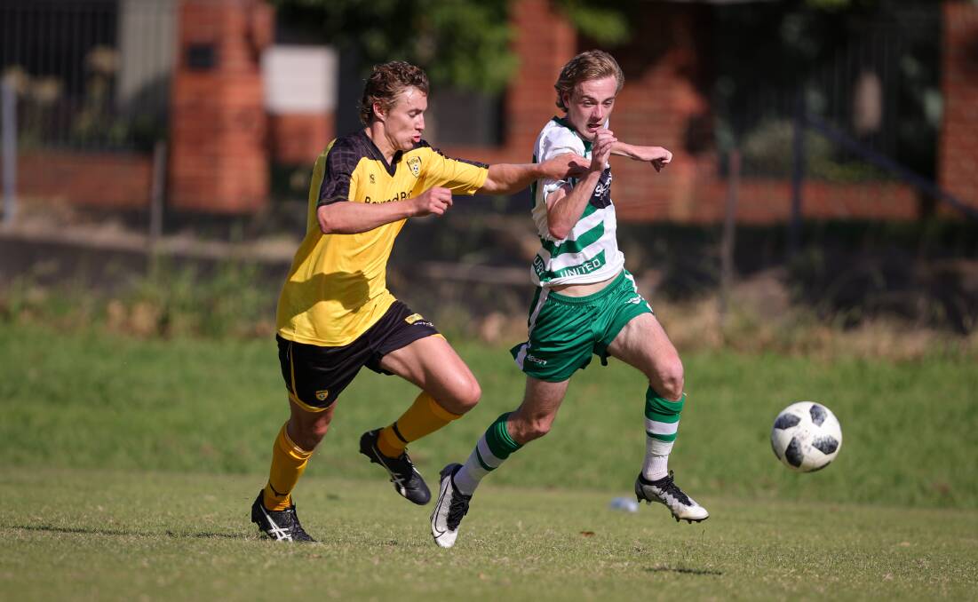 Zac Burhop tries to keep United's Jordy Hore in check. Picture: JAMES WILTSHIRE