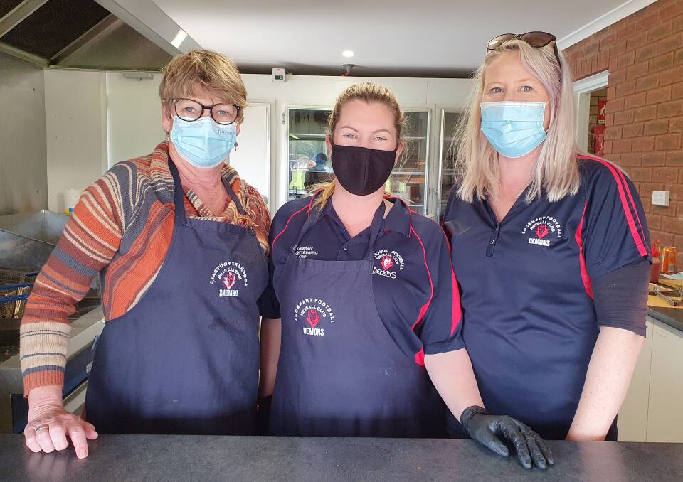 DREAM TEAM: Lockhart vice-president Tracy Hounsell (left) and her kitchen helpers.