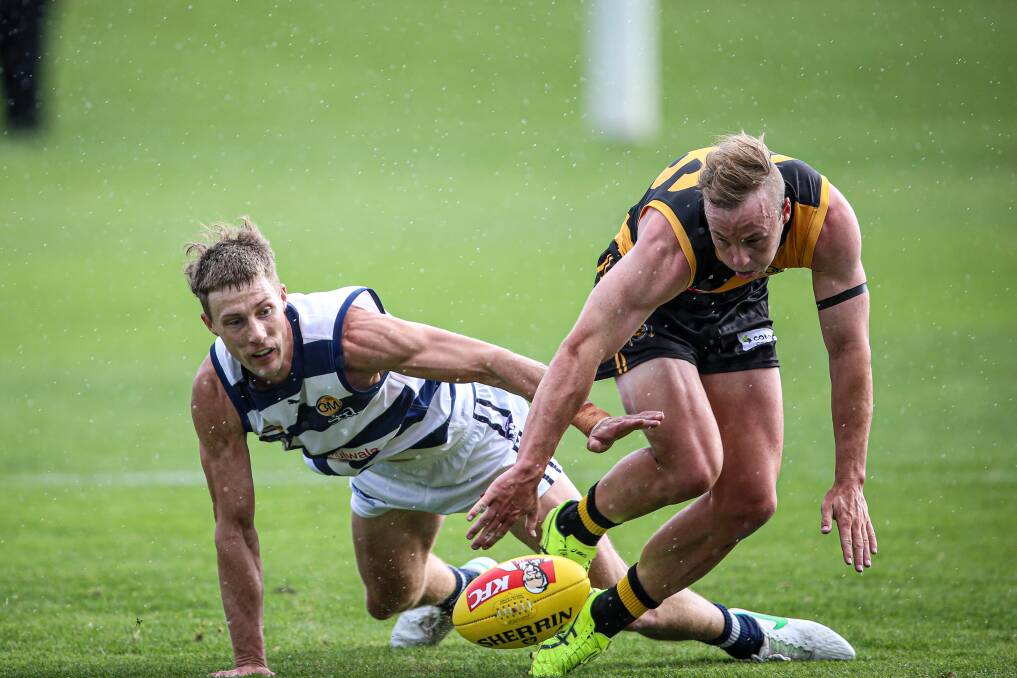 Michael Duncan tangles with Yarrawonga coach. Mark Whiley. Picture: JAMES WILTSHIRE