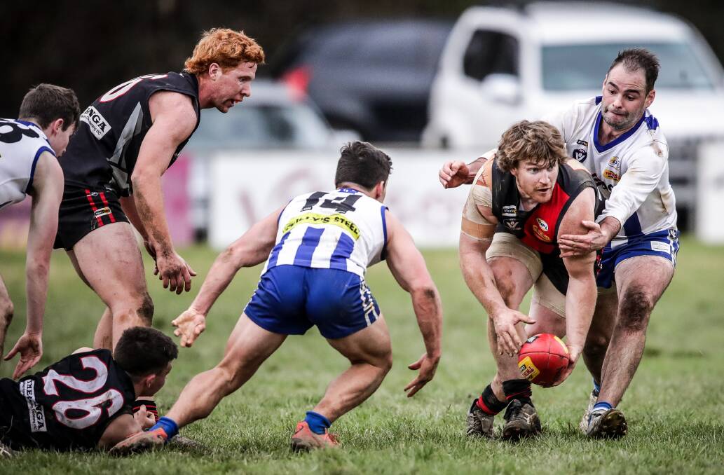 CONTRAST: Dederang-Mt Beauty's senior list is looking stronger than ever but at junior level, a player shortage could spell the end for the club's under-17 side after 50 years. Training on Tuesday is at Mt Beauty. Picture: JAMES WILTSHIRE