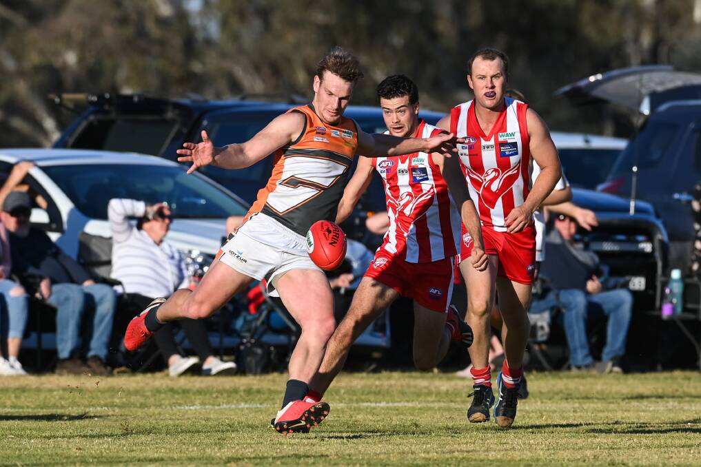 Kev Gerecke gets his kick away playing against Henty. Picture: MARK JESSER