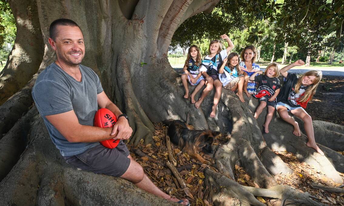 FAMILY TREE: Kade Stevens at home with wife Millie, kids Bonnie, 6, Manny, 7, Nellie, 4, Judd, 4, Mali, 9 and dog Marshall. Picture: MARK JESSER