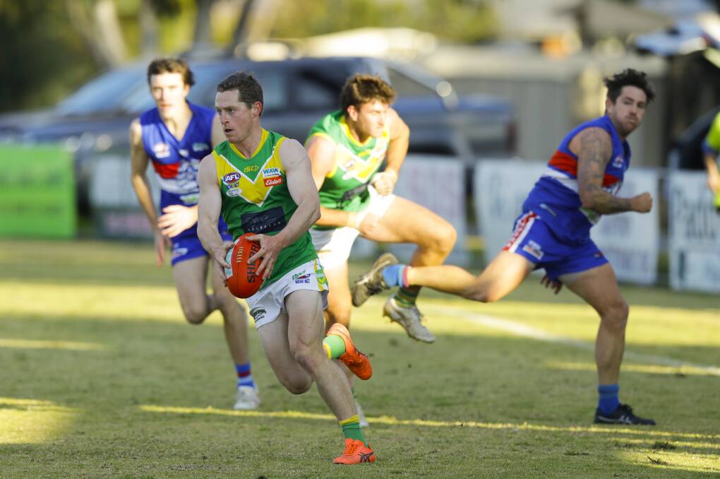 Hamish Mackinlay on the run against Jindera. Picture: ASH SMITH