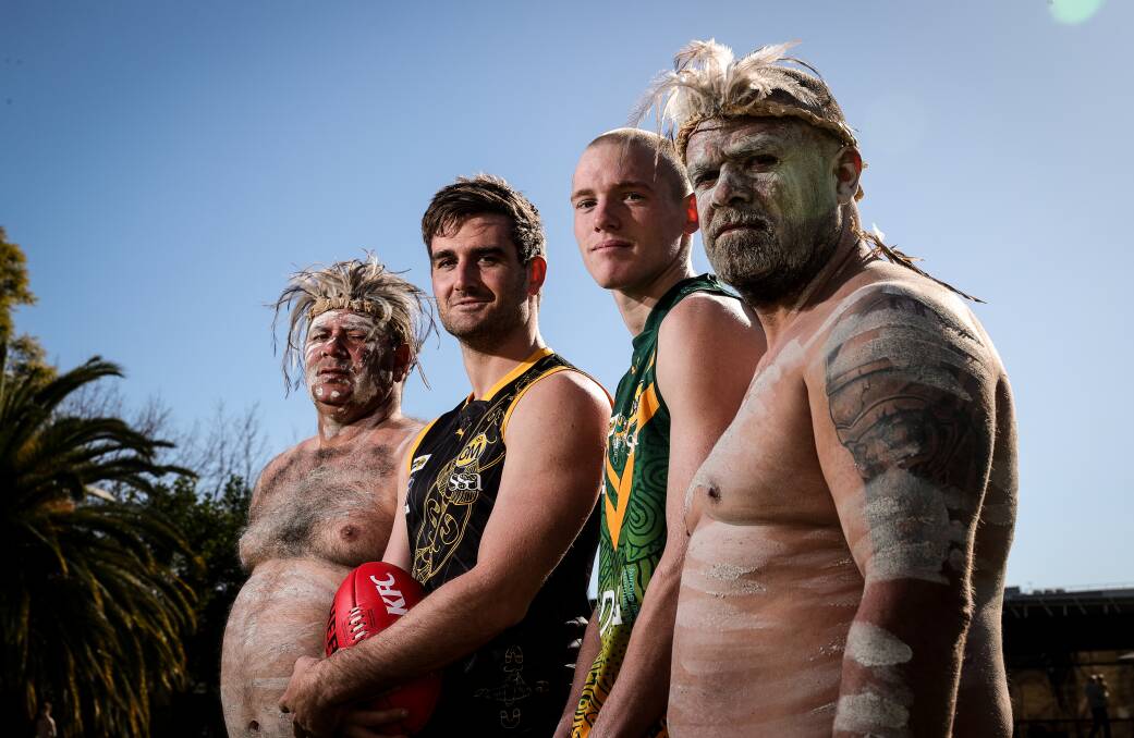 Albury co-coach Anthony Miles and North Albury's Archer Gardiner with Aboriginal dancers Richard Gilbert and and Neville Bamblett. Picture: JAMES WILTSHIRE