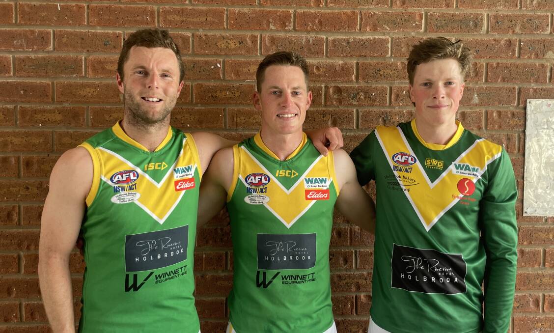SPECIAL DAY: Andrew, Hamish and Ewan Mackinlay lined up together for the first time in senior football when Holbrook took the field against Billabong Crows in the Hume league at Urana on Saturday. Picture: JESS BARR SMITH