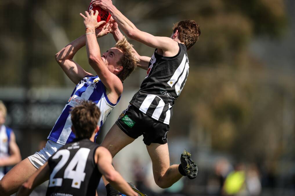 Jedd Longmire gets his hands on the footy during the Ovens and Murray thirds grand final between Corowa-Rutherglen and Wangaratta. Picture by James Wiltshire