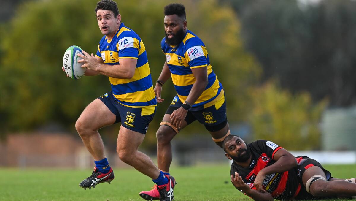 IN THE CLEAR: Liam Krautz breaks a tackle during the Albury-Wodonga Steamers' home win over Tumut Bulls, with Uraia Vuluma in support. Picture: MARK JESSER