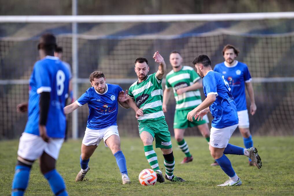 United captain Caleb Martin finds his way through midfield traffic. Picture: JAMES WILTSHIRE