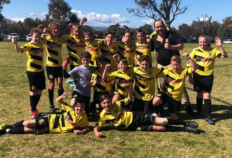 Christopher Gash coached Cobram Roar's under-13s to the league title in 2019.