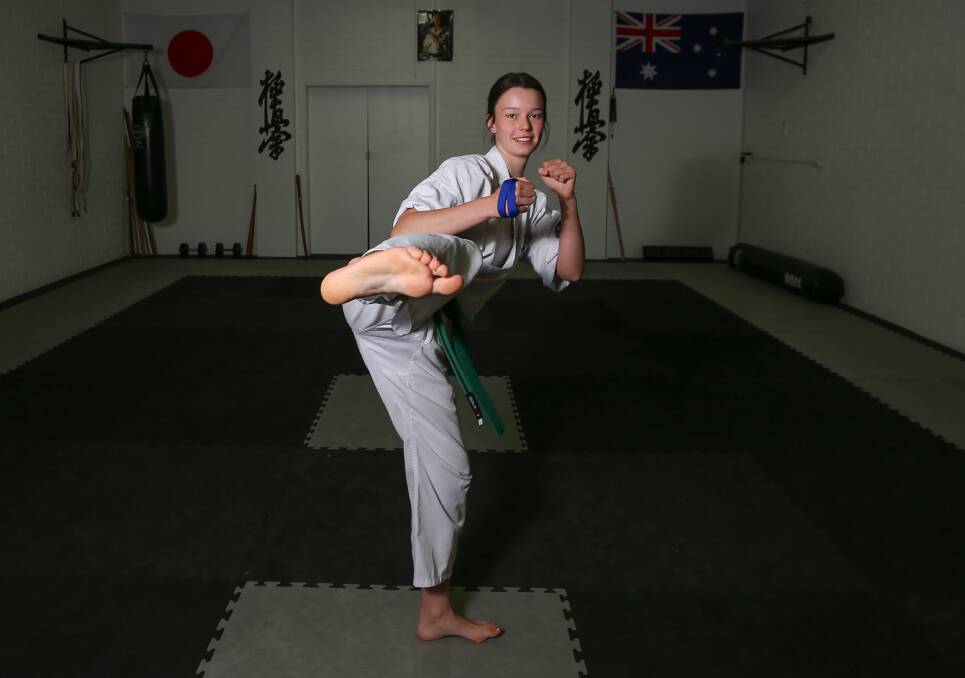 BEST FOOT FORWARD: Ava Christie is the reigning NSW state champion and is now preparing for nationals. She trains at Kyokushin Karate Albury in Lavington under Sempai Daniel Fitzgerald. Picture: TARA TREWHELLA