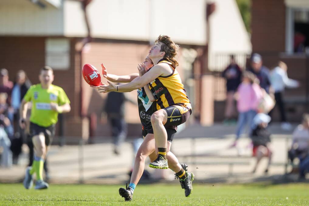 Faith Bentley, of Wangaratta Rovers, challenges Lavington's Georgia Wragge. Picture by James Wiltshire