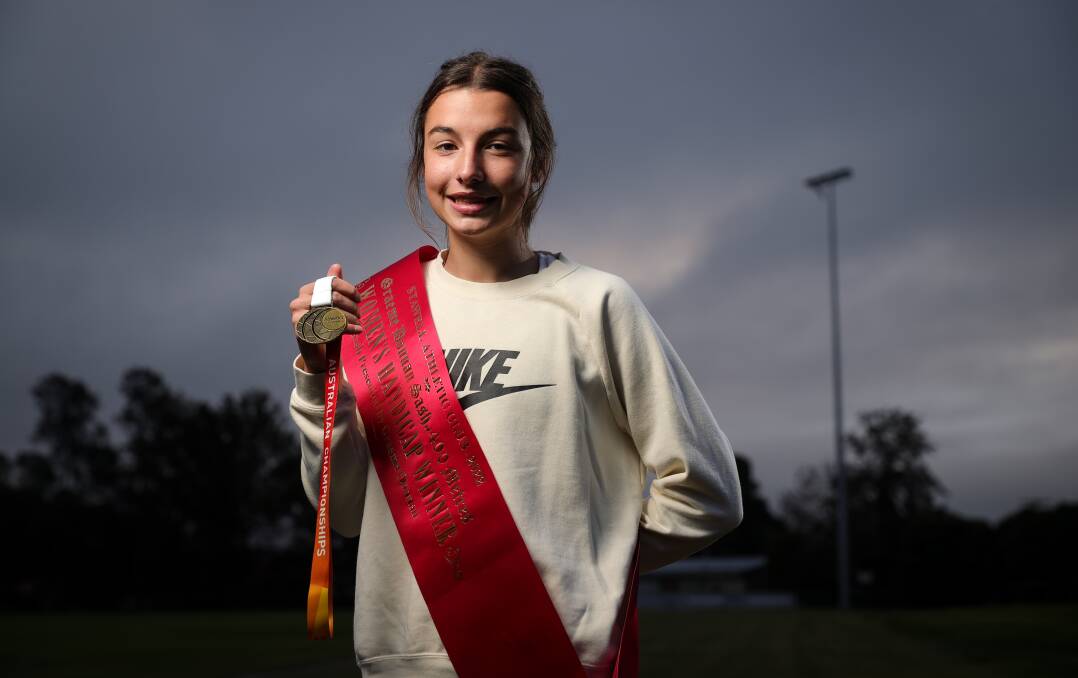 Bella Pasquali with her gold medal from the Australian Championships and the sash she won at Stawell. Picture: JAMES WILTSHIRE