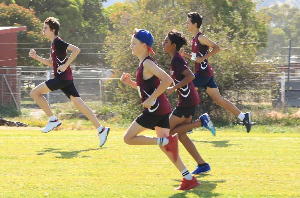 OUT OF THE BLOCKS: Jasper Summerfield, Curby Caroopen, Martin Fraser and Lucas Pickersgill enjoying a run at the Wodonga Little Athletics Centre.