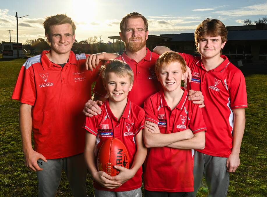 IN THE RED: Chiltern's Wayne Shannon with sons Will, 17, Brody, 10, Coby, 12, and Riley, 16. Picture: MARK JESSER