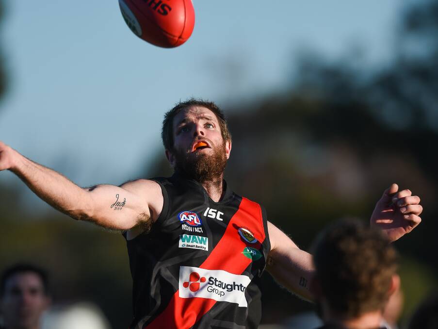 EYE ON THE BALL: Ruckman Peter Hancock in action for Howlong. He plays for Wodonga Saints against Beechworth on Saturday. Picture: MARK JESSER
