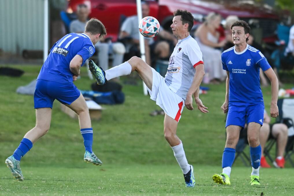 Noah Sredojevic, right, pictured during Albury City's win over Boomers. Picture: MARK JESSER