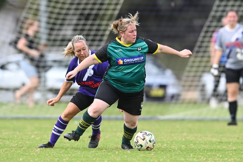 St Pats' Aoifa Brogan shields the ball from Andrea Baldwin. Picture: MARK JESSER