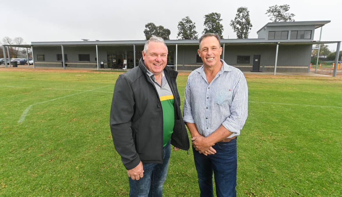 WAIT IS OVER: Holbrook Football Club president Anthony Churchill and Holbrook Sporting Complex chairman Russell Parker in front of the new building. Pictures: MARK JESSER