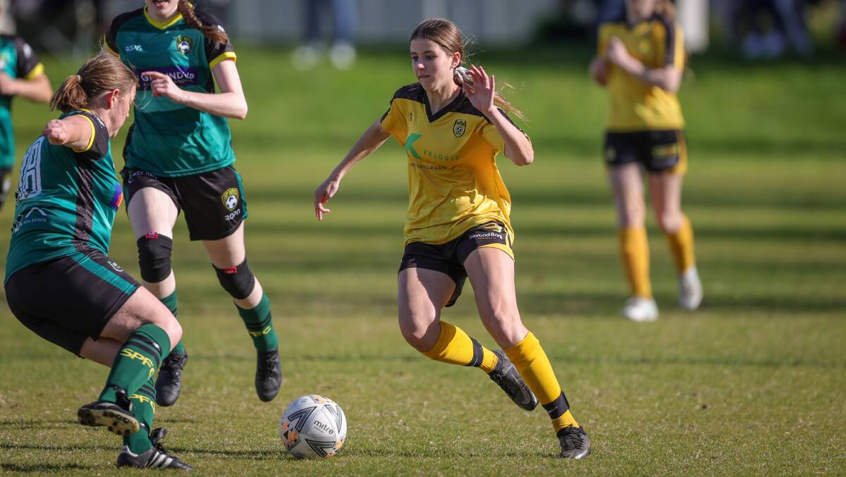 DIRECT: Elisha Wild takes on her defender as Albury Hotspurs push for more goals against St Pats. Wild, 14, now has 25 league goals to her name. Picture: JAMES WILTSHIRE
