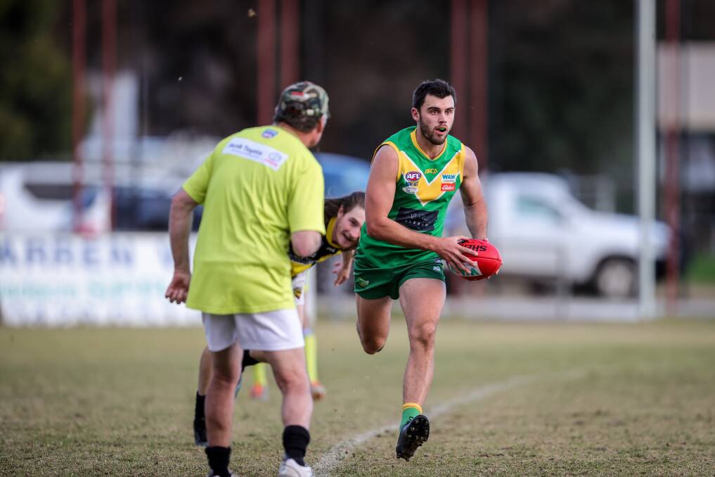 Brad Carman on the run for Holbrook. Picture: JAMES WILTSHIRE