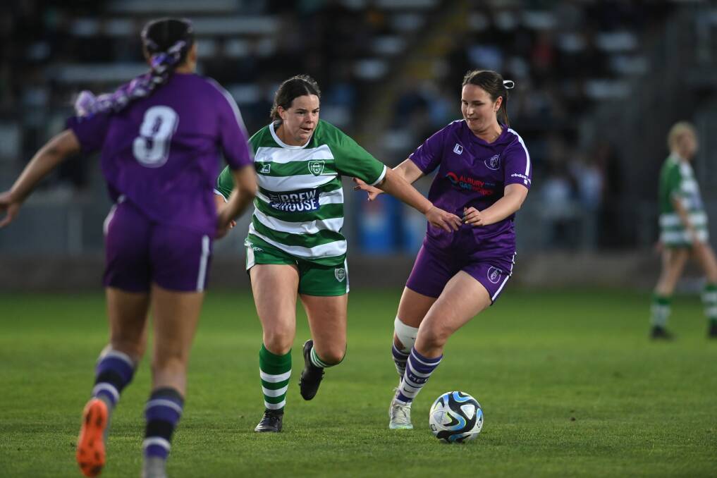 Brea Quinlivan takes on Karina Kovacs in midfield. Picture by Mark Jesser