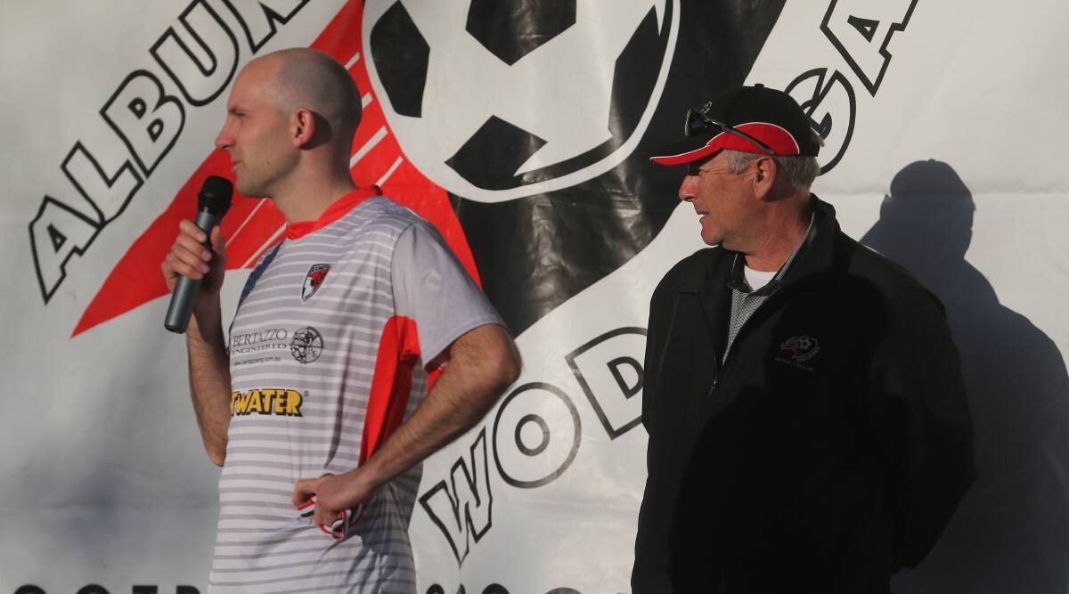 Boomers coach Andrew Grove and AWFA president Mark Leman pictured at the end-of-season presentation.