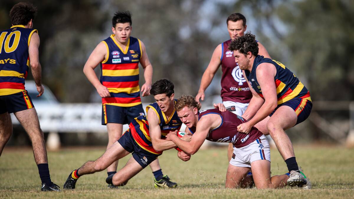 MY BALL: Nick Morris and Bailey Phillips go hard at the footy during Culcairn's narrow win away to Billabong Crows. Picture: JAMES WILTSHIRE