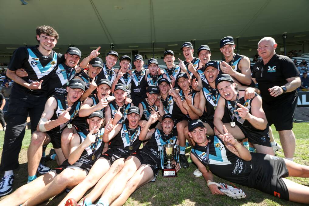 Lavington's under-18s celebrate with the premiership cup. Picture by James Wiltshire