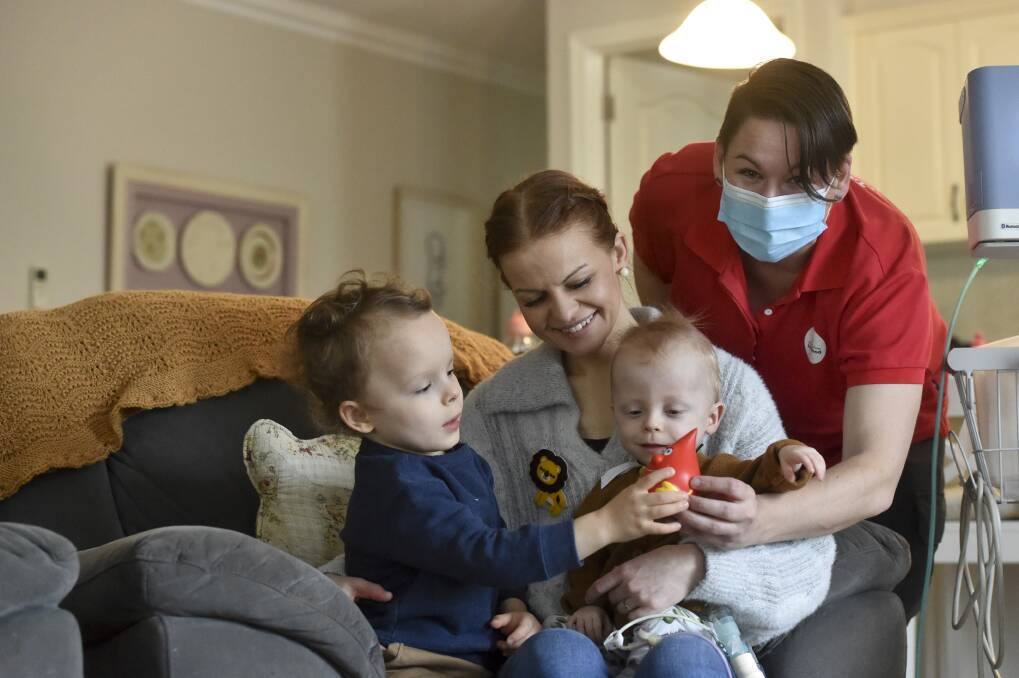 GIVE BACK: Spencer, Miriam and Griffin Stannard with Lifeblood spokesperson Shae Burns. Picture: NONI HYETT