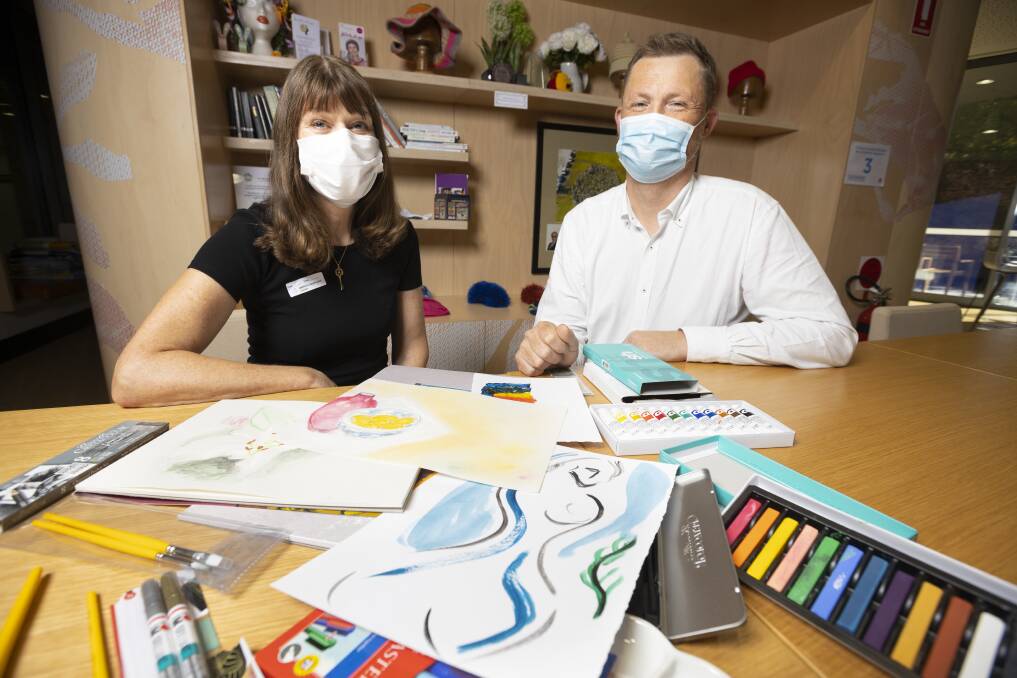 BEYOND CANCER: Art therapy workshop participant Victoria Bryant is delighted with her classes, which cancer centre wellness co-ordinator Ben Engel says aim to create a more caring, supportive environment. Picture: ASH SMITH