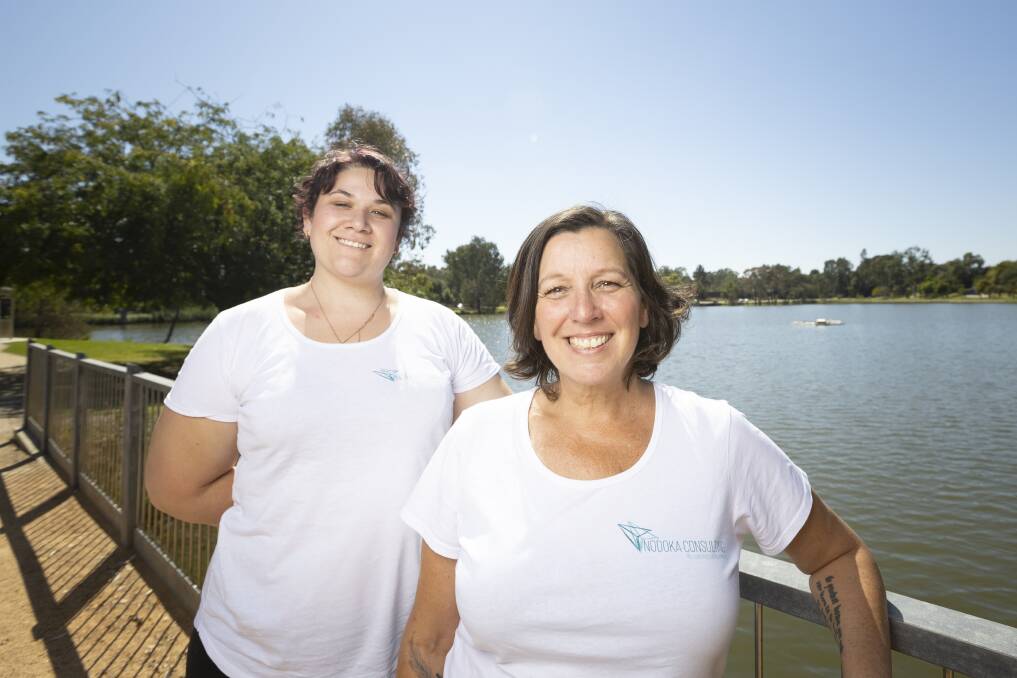 SERENITY: Nodoka Consulting recovery coaches Jodie Pilbeam (right) and her colleague Shantelle Neyra offer walk and talk sessions on Friday mornings at Wodonga's Sumsion Gardens. Picture: ASH SMITH