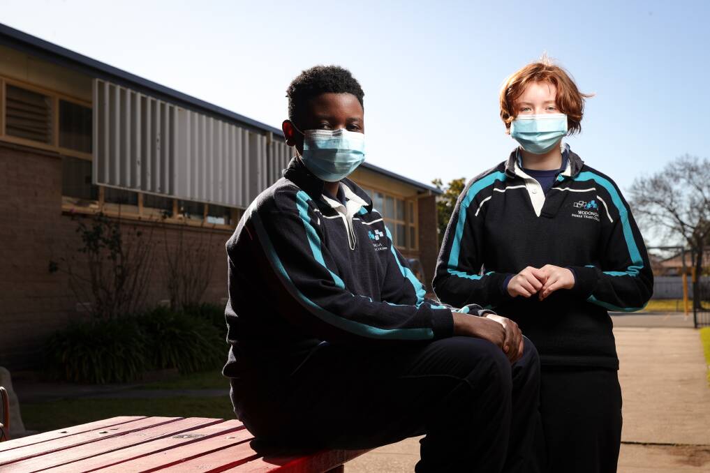 NO PROBLEM: Year 8 students at Wodonga Middle Years College Huon Campus Shelby Makanda and Mat Davies, both aged 13, were in the minority when they wore their masks in the classroom. Picture: JAMES WILTSHIRE