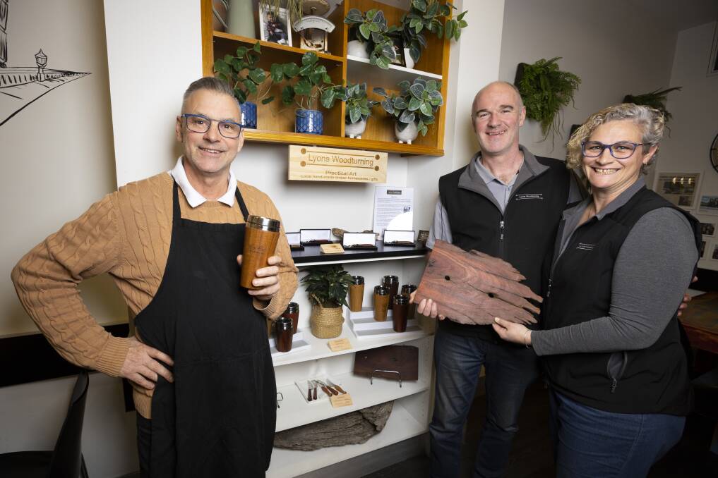 SAME PHILOSOPHY: Citi Cafe owner Jeff Claxton has partnered with Angus and Patricia Lyons of Lyons Woodturning in Jindera. The business showcases quality wooden products handmade from recycled materials. Pictures: ASH SMITH