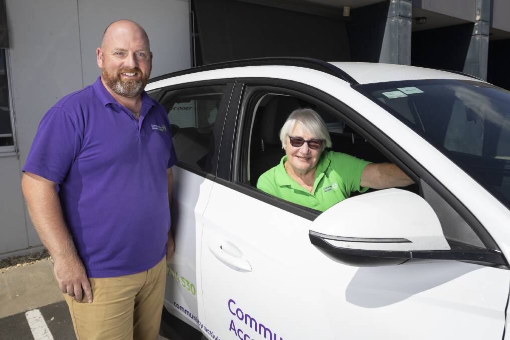 OPEN CALL: Community Accessability acting chief executive officer Aidan Kilroy and driver Joan Waldon are seeking more volunteer drivers. Picture: ASH SMITH
