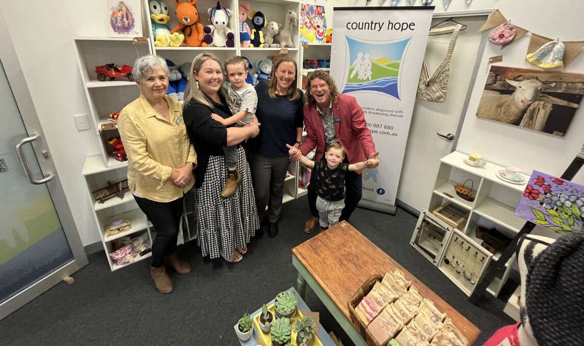 MORE THAN A SHOP: Country Hope has opened in Albury with general manager Ellie Webb, Lauren Ryall, Mason Ryall, 4, Kristy McMahon, Lincoln Ryall, 3, and founding board member Steve Bowen. Pictures: SUPPLIED