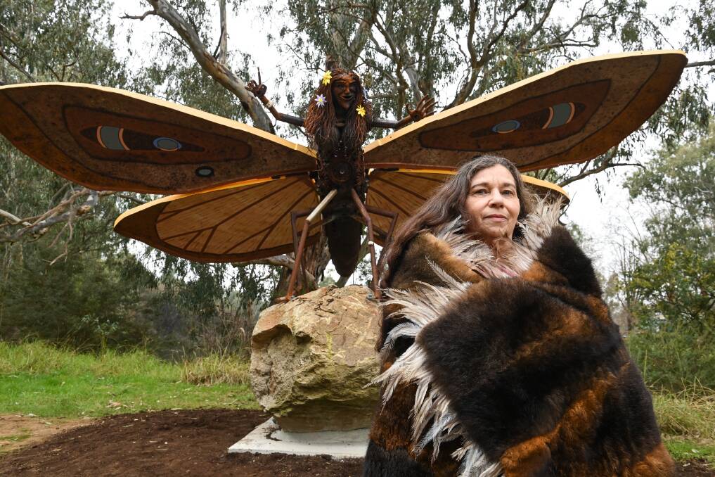 FAMILY STORY: Indigenous rtist Treahna Hamm stand before her sculpture, Myee, at the official Opening of Gateway Island Cultural Sculpture Walk. Picture: MARK JESSER