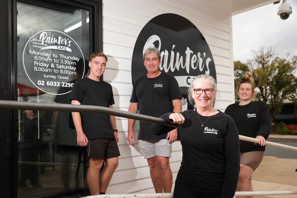 WELCOME NEWS: The government announcement on Wednesday for updated COVID-19 rules was something to smile about at Painter's Cafe. Ned Harvey, Ian Rogers, Bernie Rogers and Meg Rogers. Pictures: JAMES WILTSHIRE